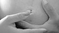 handen op een zwangere buik